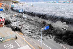 A wave approaches Miyako City from the Heigawa estuary in Iwate Prefecture after the magnitude 8.9 earthquake struck the area March 11, 2011. Picture taken March 11, 2011. REUTERS/Mainichi Shimbun(JAPAN - Tags: DISASTER ENVIRONMENT IMAGES OF THE DAY) FOR EDITORIAL USE ONLY. NOT FOR SALE FOR MARKETING OR ADVERTISING CAMPAIGNS. JAPAN OUT. NO COMMERCIAL OR EDITORIAL SALES IN JAPAN (Newscom TagID: rtrlfour470055) [Photo via Newscom]